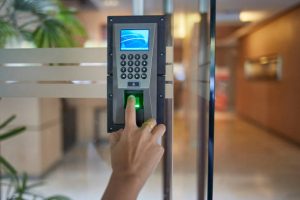 Yong men or women push down the electronic control machine to access the door Branded Access 300x200