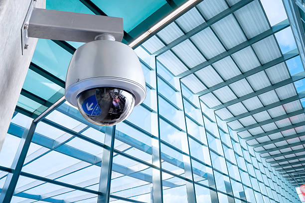 security, cctv camera for office building at night in london. security, cctv camera for office building at night in london.